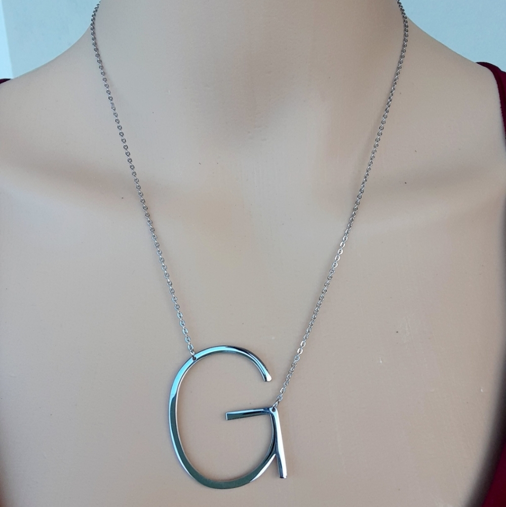 18 k gold plated, silver color womens necklace.